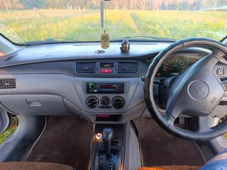 2002 Mitsubishi Lancer Cedia IX, серебристый, 255000 рублей, вид 3
