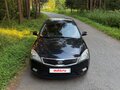 2011 Kia Ceed I Рестайлинг, чёрный, 850000 рублей - вид 1