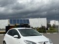 2011 Mazda 2 II Рестайлинг (DE2), белый - вид 1