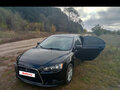 2008 Mitsubishi Lancer X, чёрный, 650000 рублей - вид 2