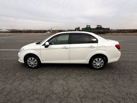 2013 Toyota Corolla Axio XI (E160, E170, E180), белый, 990000 рублей - вид 9