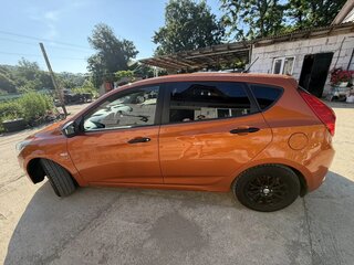 2015 Hyundai Solaris I Рестайлинг, оранжевый, 1100000 рублей, вид 5