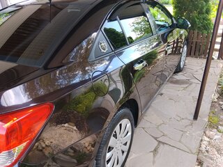 2014 Chevrolet Cruze I Рестайлинг, коричневый, 899000 рублей, вид 4