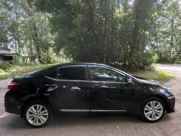 2013 Toyota Corolla XI (E160, E170, E180), чёрный, 1450000 рублей - вид 4