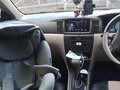 2002 Toyota Corolla Fielder IX (E120, E130), белый, 550000 рублей - вид 9