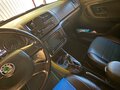 2011 Skoda Fabia II Рестайлинг, зелёный - вид 3