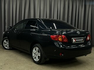 2010 Toyota Corolla X (E140, E150), чёрный, 689777 рублей, вид 2