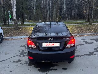 2014 Hyundai Solaris I, чёрный, 730000 рублей, вид 4