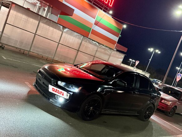 2008 Mitsubishi Lancer X, чёрный, 730000 рублей - вид 9