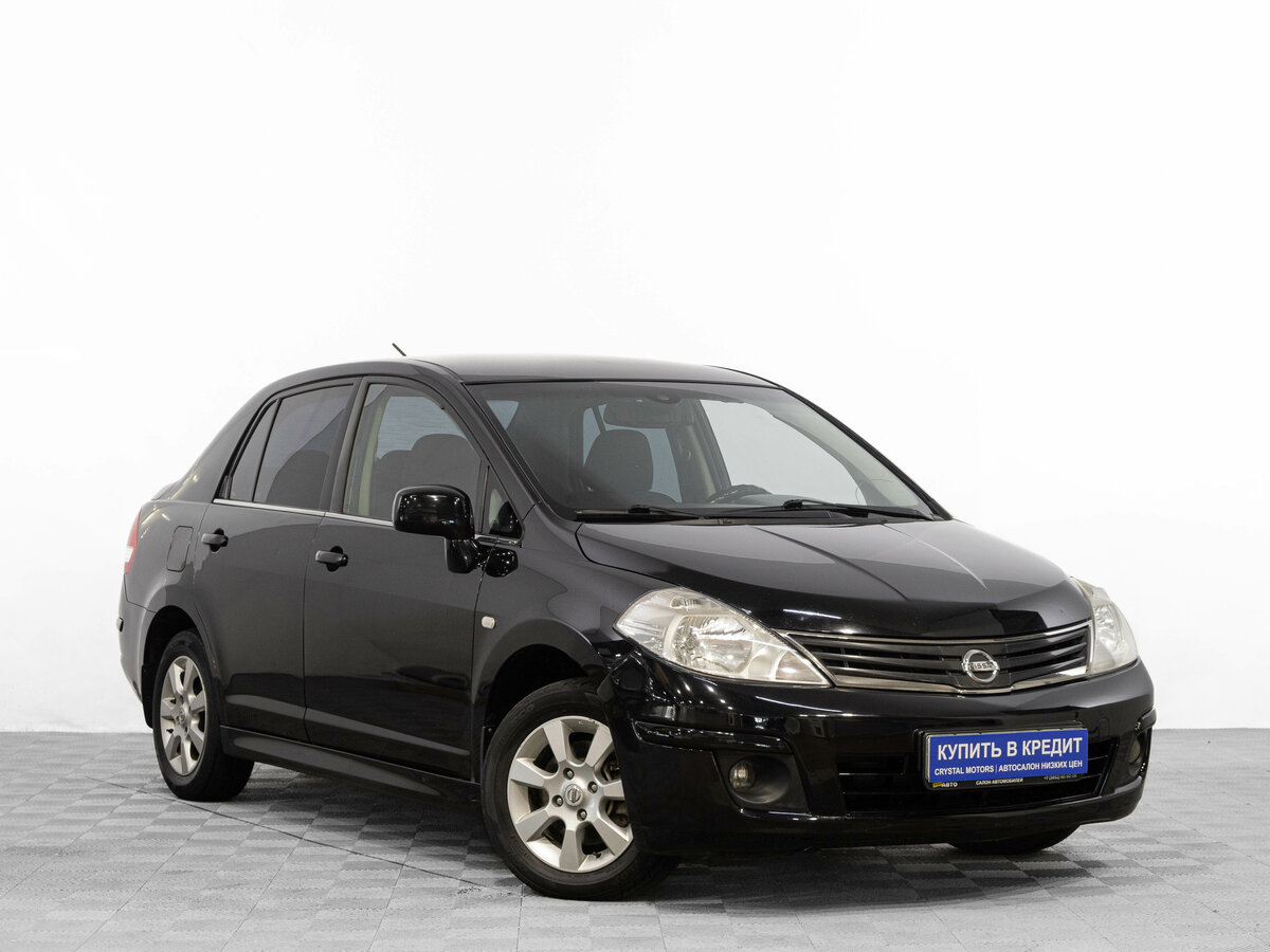 Открыть фотографии: Nissan Tiida I Рестайлинг