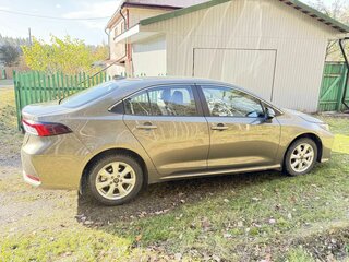 2019 Toyota Corolla XII (E210), коричневый, 2100000 рублей, вид 2