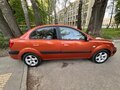 2006 Kia Rio II, оранжевый, 450000 рублей - вид 2