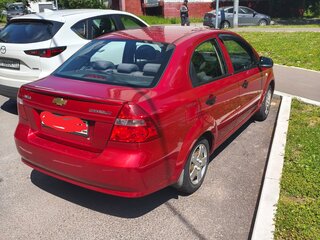 2010 Chevrolet Aveo I Рестайлинг, красный, 380000 рублей, вид 5