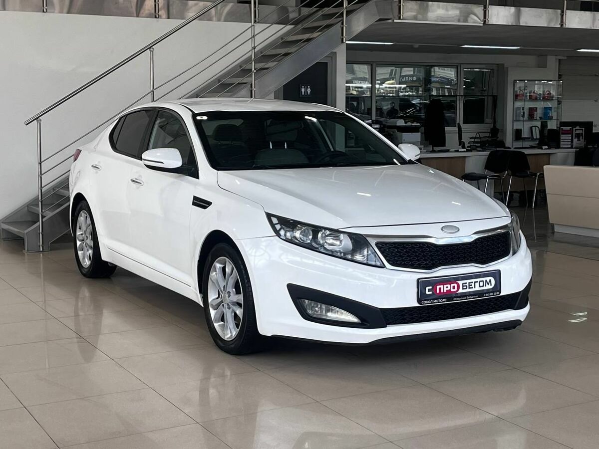 Открыть фотографии: Kia Optima III