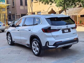 2023 BMW X1 Long 20Li sDrive III (U11/U12), белый, 2670000 рублей, вид 4