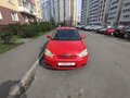 2005 Toyota Corolla IX (E120, E130) Рестайлинг, красный, 480000 рублей - вид 1