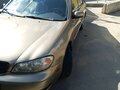 2002 Nissan Maxima V (A33), золотистый, 250000 рублей - вид 5