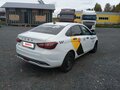 2023 Lada (ВАЗ) Vesta I Рестайлинг (NG), белый, 815100 рублей - вид 2