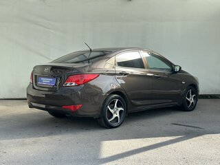 2016 Hyundai Solaris I Рестайлинг, коричневый, 990000 рублей, вид 4