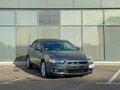 2008 Mitsubishi Lancer X, серый, 493000 рублей - вид 1