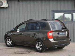 2010 Kia Carens II (UN), коричневый, 729999 рублей, вид 4