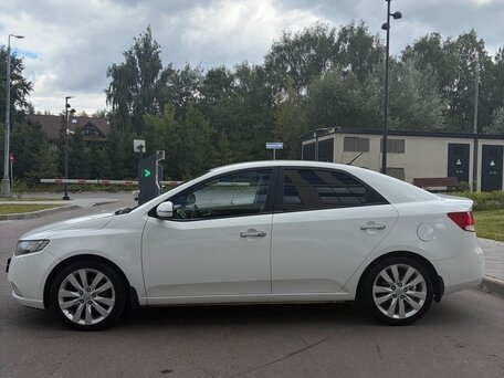 2011 Kia Cerato 6-speed II, белый, 800000 рублей, вид 4