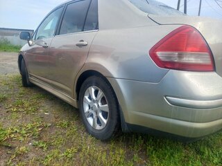2010 Nissan Tiida I Рестайлинг, коричневый, 640000 рублей, вид 3