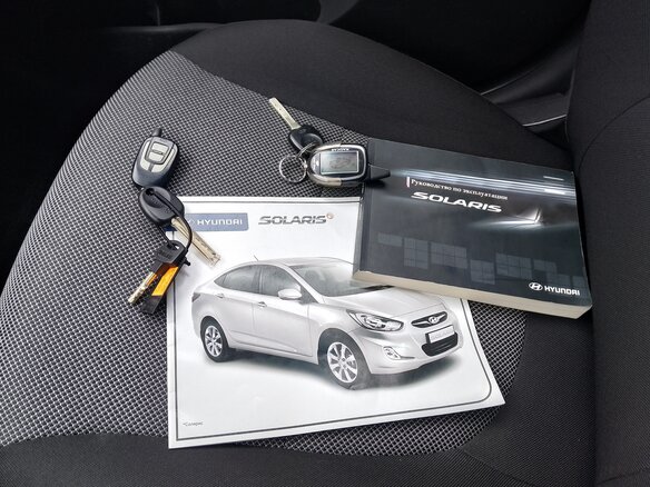 2011 Hyundai Solaris I, красный, 729000 рублей - вид 10