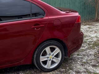 2008 Mitsubishi Lancer X, красный, 550000 рублей, вид 3