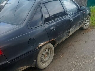 2010 Daewoo Nexia I Рестайлинг, чёрный, 90000 рублей, вид 3