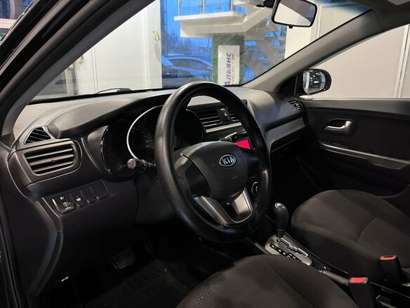 2012 Kia Rio 4-speed III, чёрный - вид 22