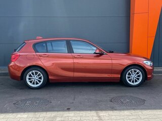 2018 BMW 1 серии 118i II (F20/F21) Рестайлинг 2, оранжевый, 1649000 рублей, вид 3