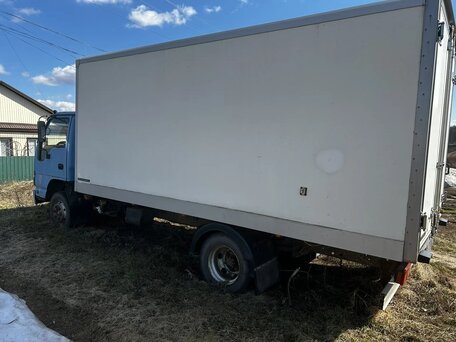 2009 Isuzu Elf (N-series), синий, 1200000 рублей, вид 1