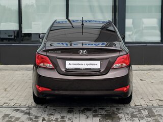 2016 Hyundai Solaris I Рестайлинг, коричневый, 919000 рублей, вид 4