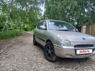 2001 Toyota Duet, золотистый, 115000 рублей, вид 1