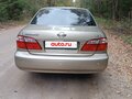 2003 Nissan Maxima V (A33), жёлтый - вид 3