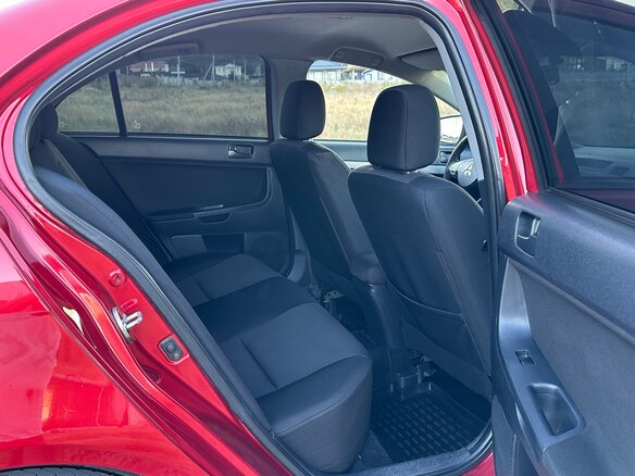 2007 Mitsubishi Lancer X, красный - вид 16