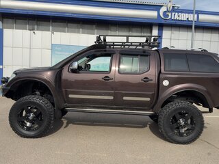 2010 Nissan Navara (Frontier) III (D40), серый, 2800000 рублей, вид 4