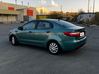 2011 Kia Rio 4-speed III, зелёный, 600000 рублей, вид 5