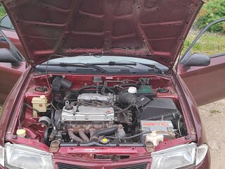 1995 Mitsubishi Carisma I, пурпурный, 255000 рублей, вид 5