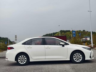 2022 Toyota Corolla XII (E210), белый, 1140000 рублей, вид 4