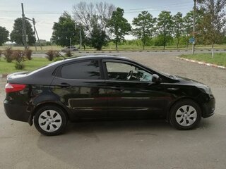 2012 Kia Rio III, чёрный, 590000 рублей, вид 5