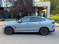 2024 BMW X6 40i III (G06) Рестайлинг, серый - вид 1
