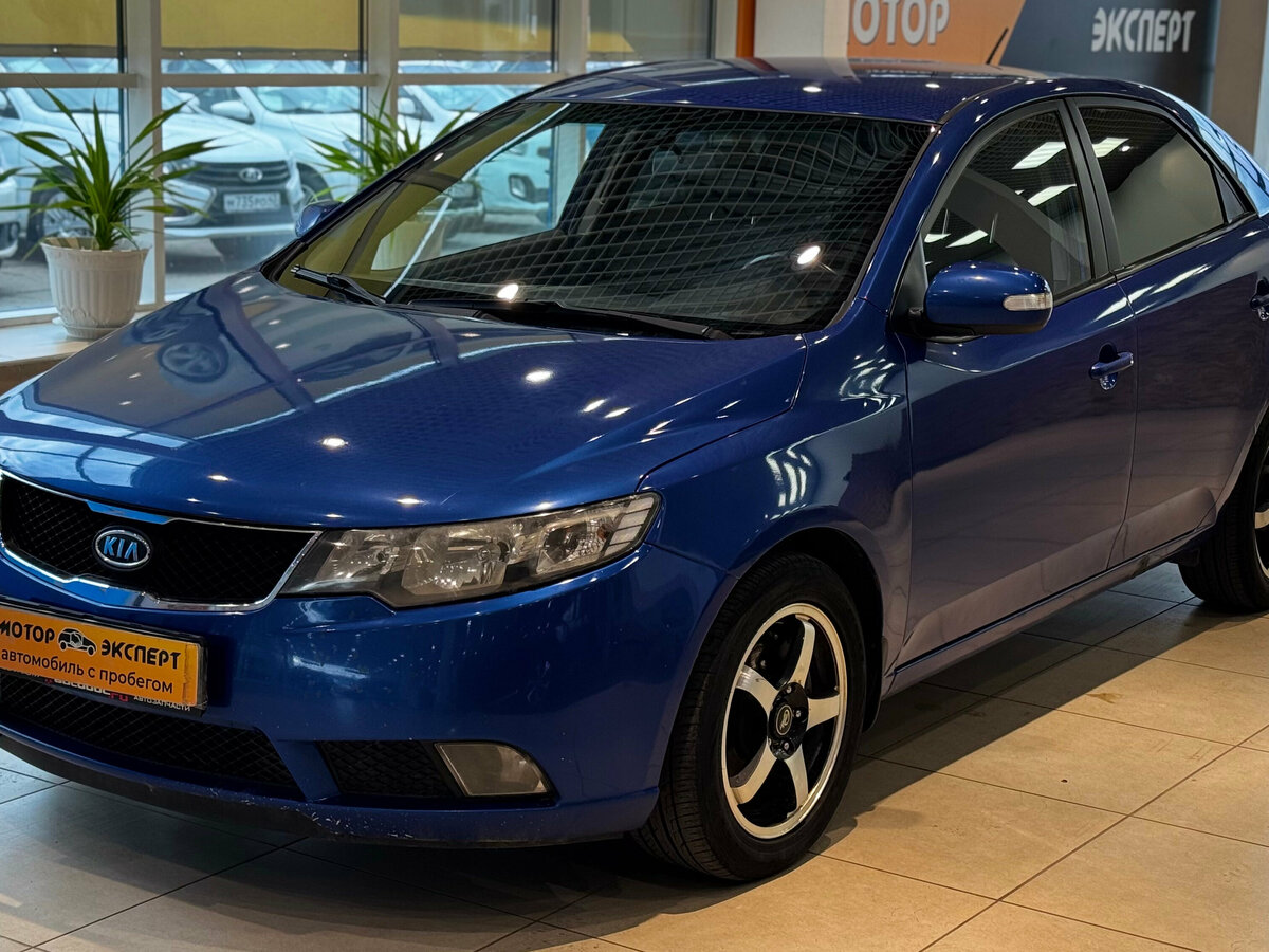 Открыть фотографии: Kia Cerato II