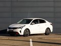 2021 Kia Rio IV Рестайлинг, белый, 1555000 рублей