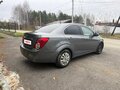2014 Chevrolet Aveo II, серый, 750000 рублей - вид 4