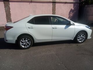 2018 Toyota Corolla XI (E160, E170, E180) Рестайлинг 1, белый, 1950000 рублей, вид 4