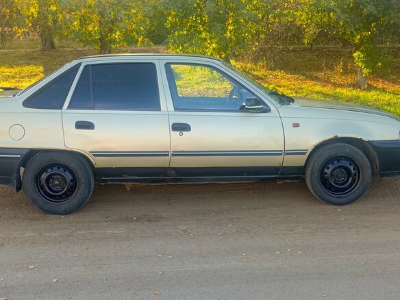 2006 Daewoo Nexia I, бежевый - вид 3
