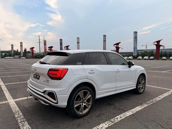 2022 Audi Q2 L 35 TFSI I Рестайлинг, белый, 1590000 рублей - вид 4