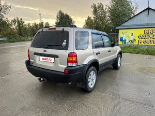 2001 Ford Maverick III, золотистый, 680000 рублей, вид 3